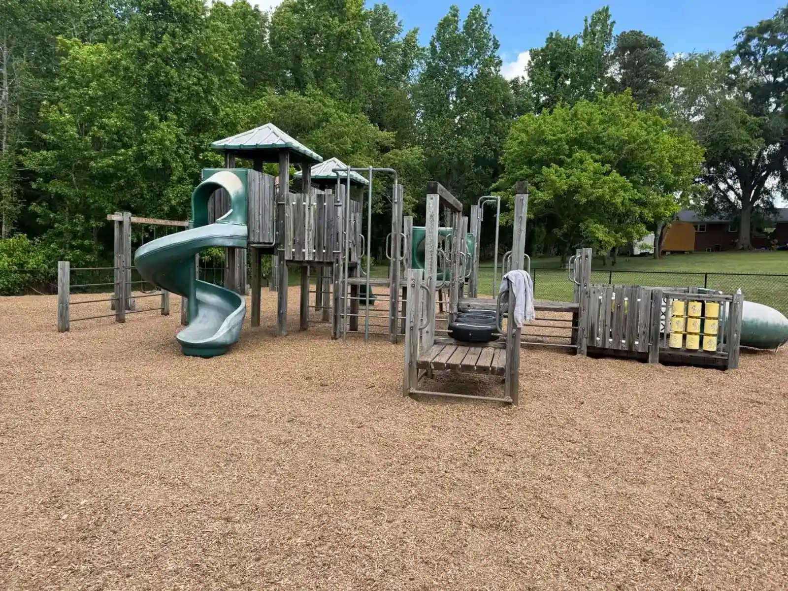 Playground with fresh mulch spread around the play equipment